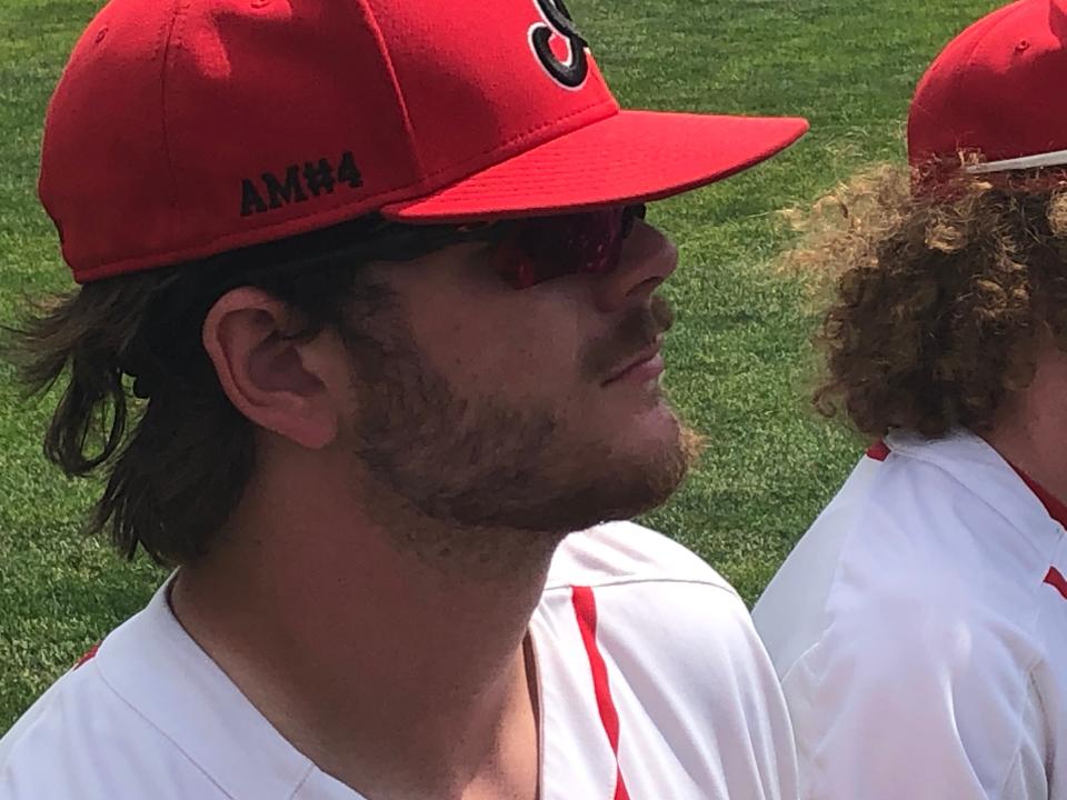 The side of Brimfield-Elmwood pitcher/first baseman Frank Kelch shows the "AM#4" symbol in honor of the late Aaron Miller, who would have been a senior and teammate on the field Monday. He died in a 2020 car accident.