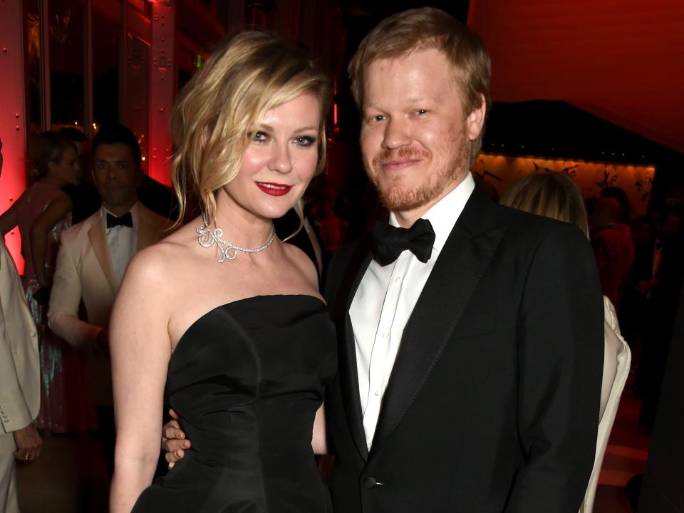 Actors Kirsten Dunst (L) and Jesse Plemons attend the 2017 Vanity Fair Oscar Party hosted by Graydon Carter at Wallis Annenberg Center for the Performing Arts on February 26, 2017 in Beverly Hills, California.