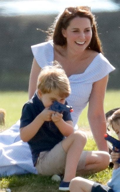 Take aim: Prince George's attention wavers from the polo - Credit: Max Mumby