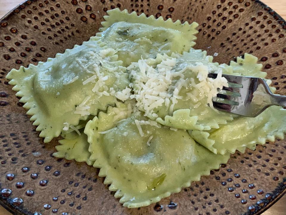 Trader Joe's Brussels sprouts and uncared bacon ravioli with cheese