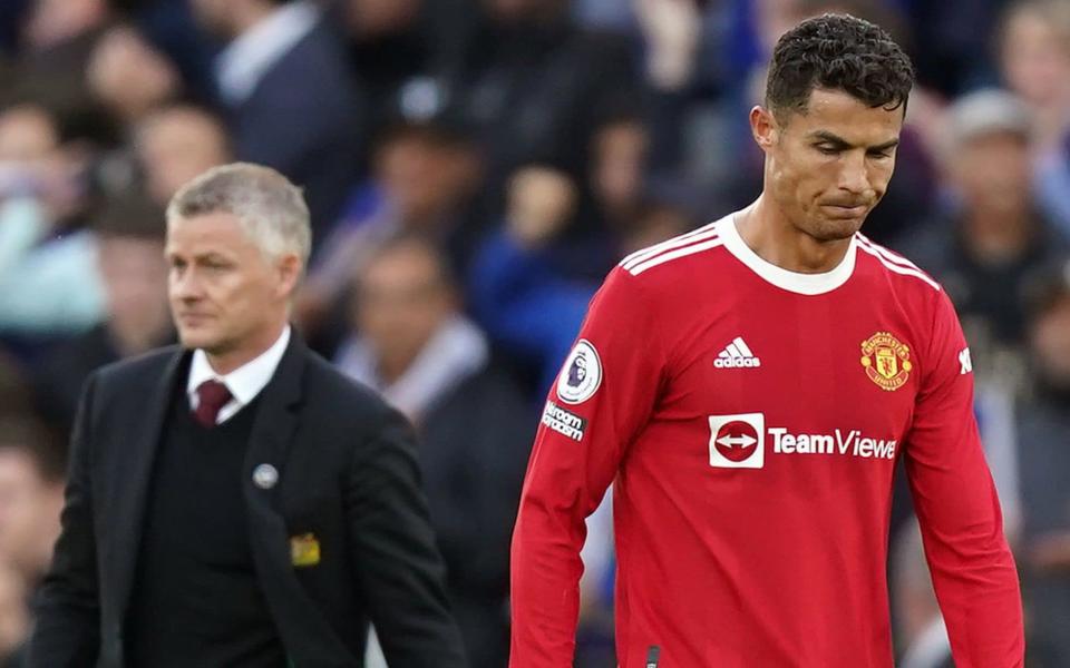 Manchester United manager Ole Gunnar Solskjaer and Cristiano Ronaldo following the Premier League match - PA