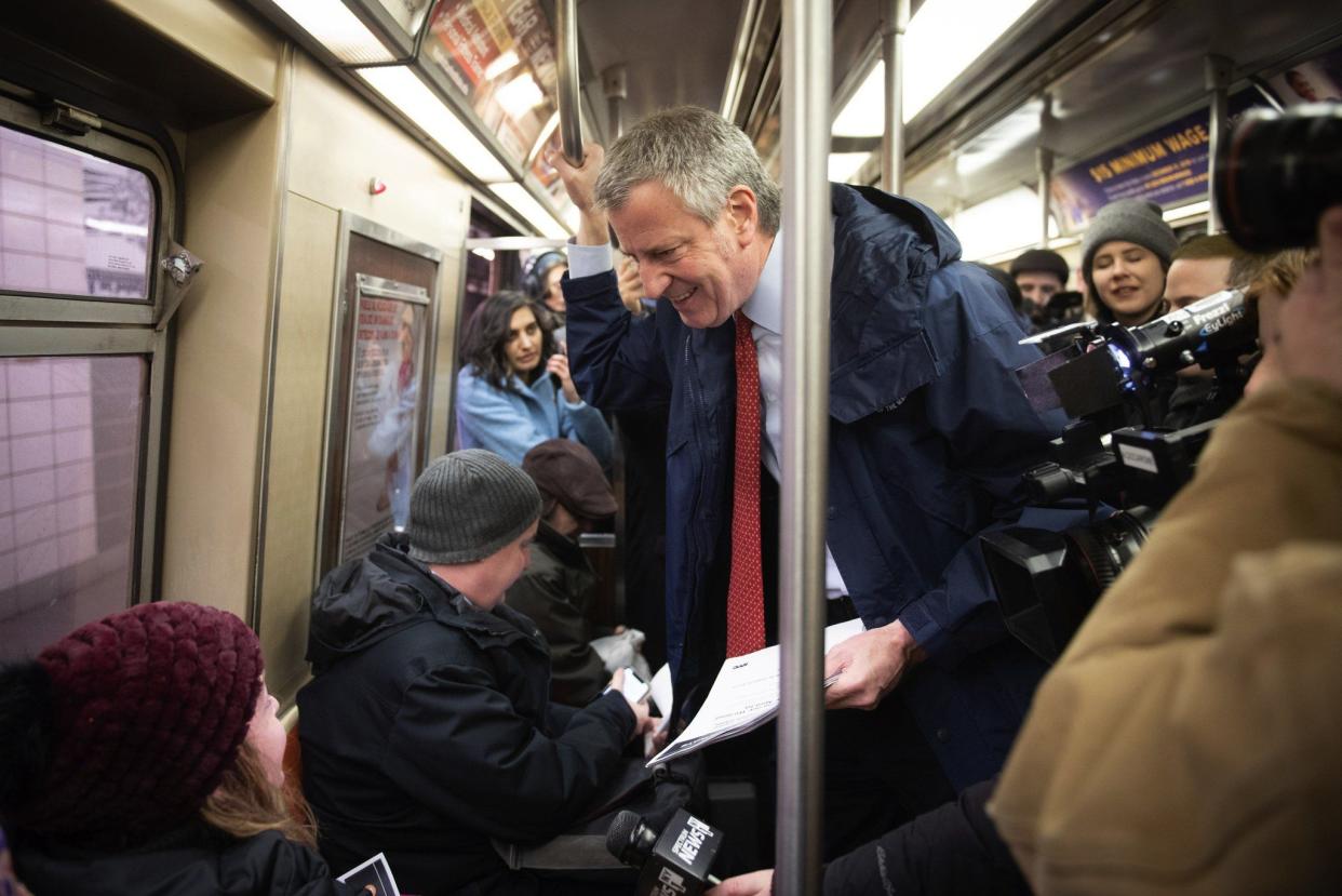 Mayor Bill de Blasio rides the R Subway train to City Hall from Park Slope to inform riders of of new plan to fund the MTA on February 27, 2019.