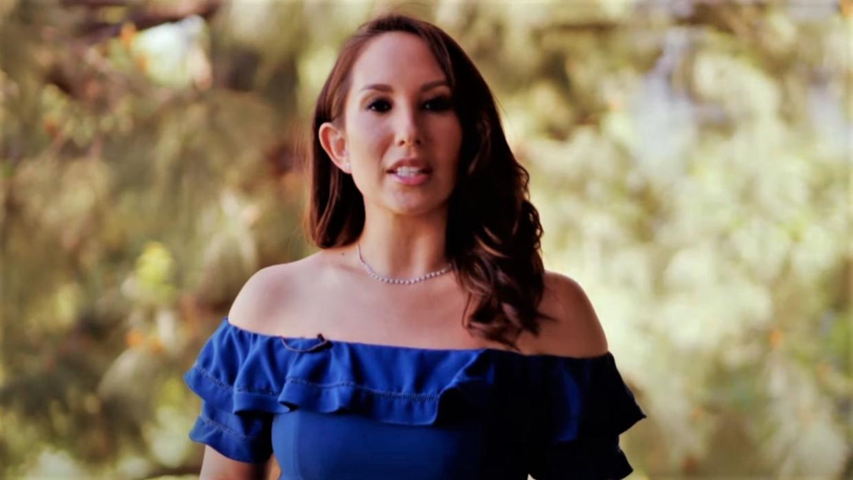  Cheryl Burke in blue dress in Diving Deep with Cheryl Burke 