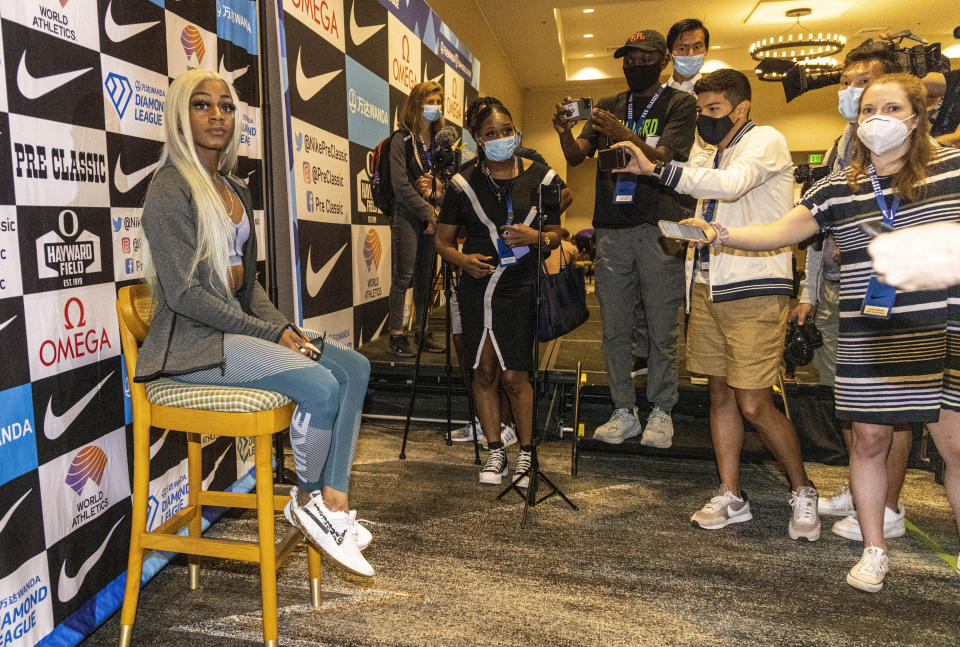 Sha'carri Richardson attends a news conference Friday, Aug. 20, 2021, a day before competing in the 100 meters at the Pre Classic track and field meet in Eugene, Ore. (AP Photo/Thomas Boyd)