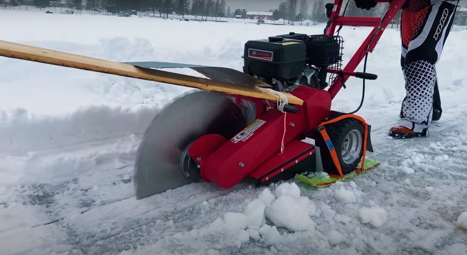 A stump grinder with an blade used to make an ice carousel