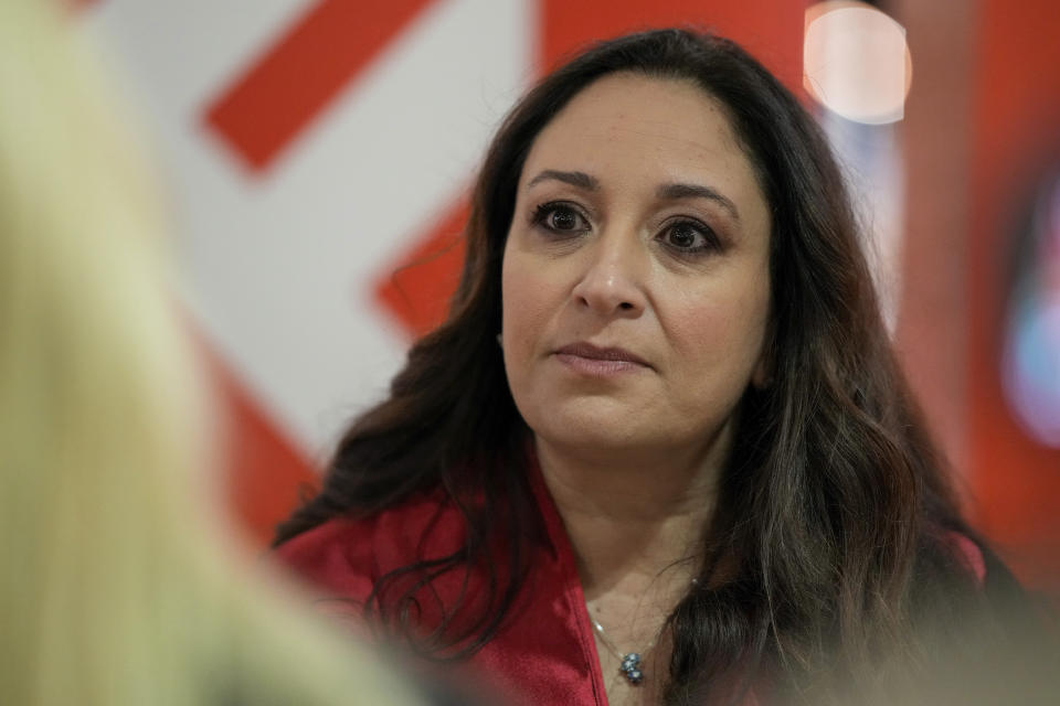 Lawyer Laura Sgro' presents her book Sangue in Vaticano (Blood in The Vatican), during its launch in Rome, Tuesday, Nov. 29, 2022. The book is about the case of Swiss Guard Corporal Cedric Tornay who allegedly committed suicide in the Vatican after killing guards' commander Alois Estermann and his Venezuelan wife Gladys Meza Romero in 1998. (AP Photo/Andrew Medichini)