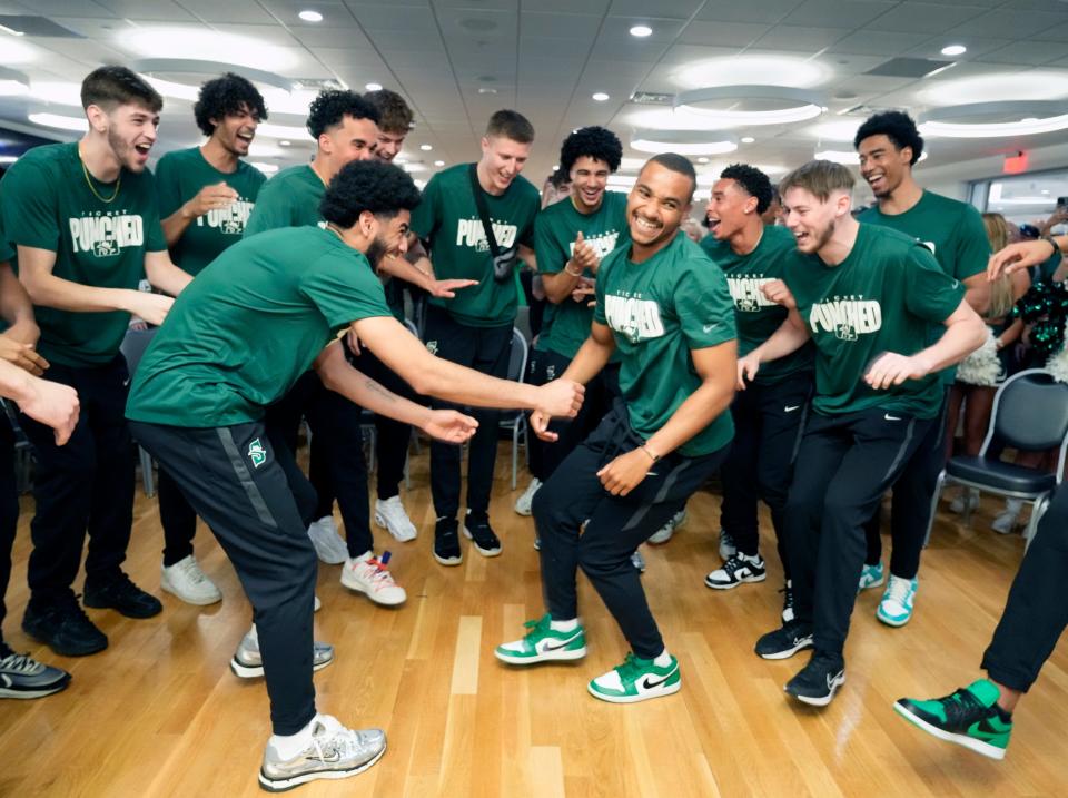 Led by Stephan Swenson (center), the Hatters dance after learning their opponent and destination for the first round of the NCAA Tournament, Sunday, March 17, 2024.
