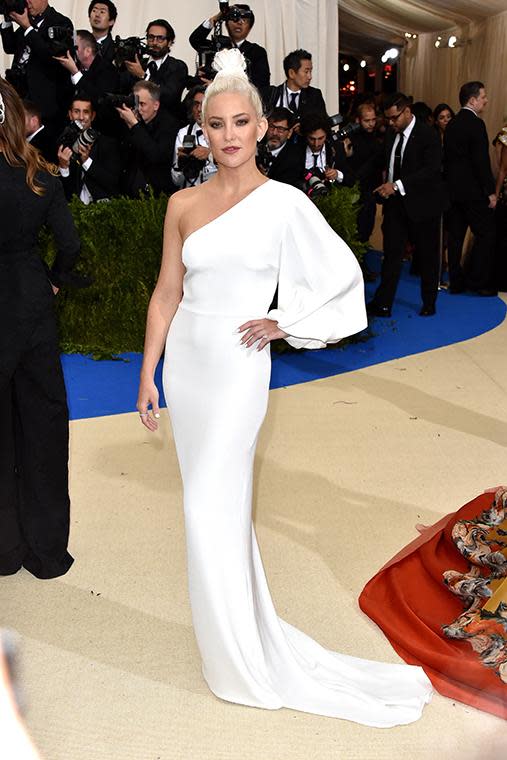 Kate rocked an extremely high bun and dark eye make-up in this white Stella McCartney gown.