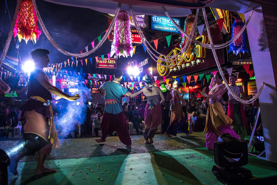 Performers dancing at event