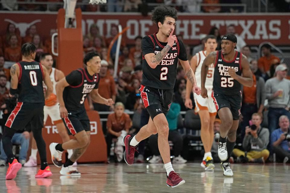 Texas Tech guard Pop Isaacs (2) reacts after scoring a three-point basket during the Big 12 basketball game against Texas, Saturday, Jan. 6, 2024, at Moody Center in Austin.