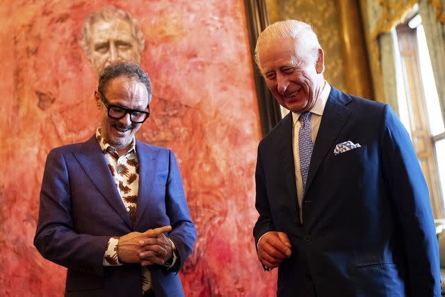 <p>Press Association via AP Images</p> Jonathan Yeo and King Charles at the unveiling of the portrait commissioned by The Draper's Company at Buckingham Palace on May 14, 2024.