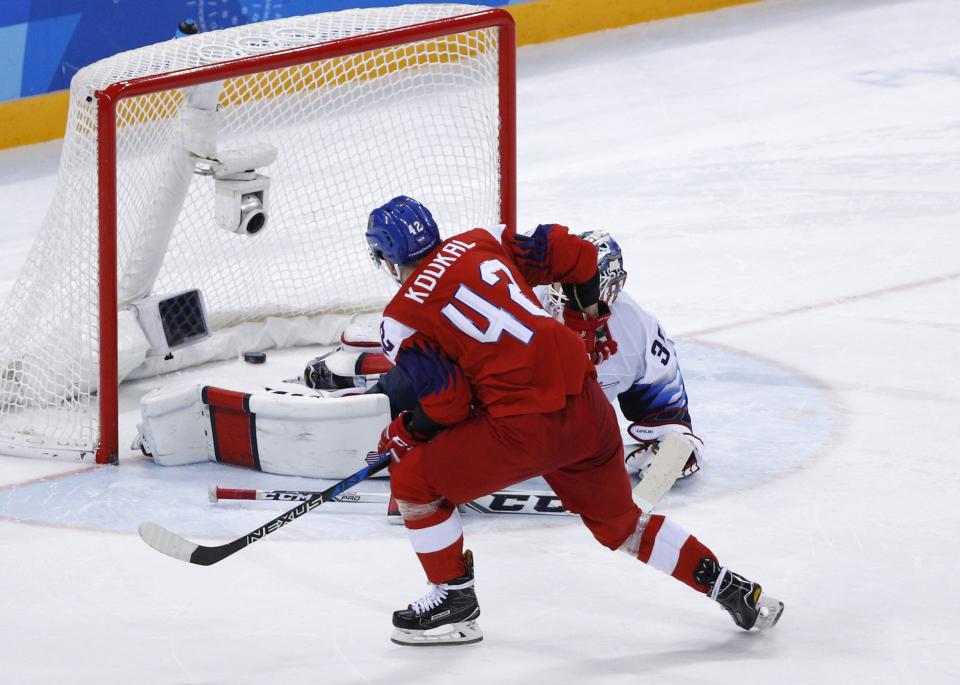 Petr Koukal of the Czech Republic scores on goalie Ryan Zapolski of U.S. in a shootout. (REUTERS)