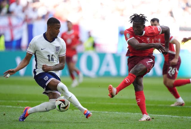 England’s Ezri Konsa (left) blocks a shot from Switzerland’s Breel Embolo