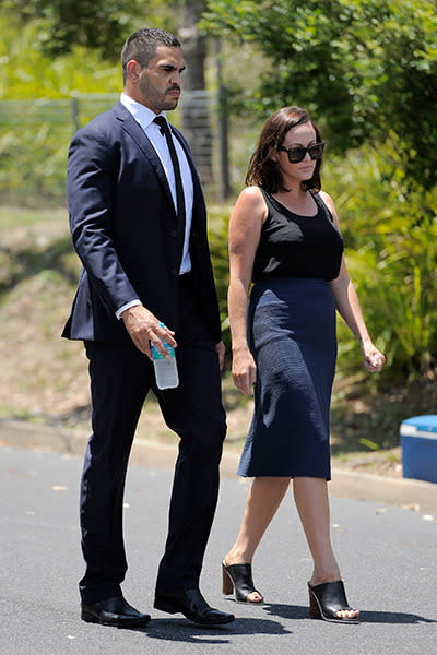 Rugby League player Greg Inglis and girlfirend Sally Robinson arriving at the funeral.