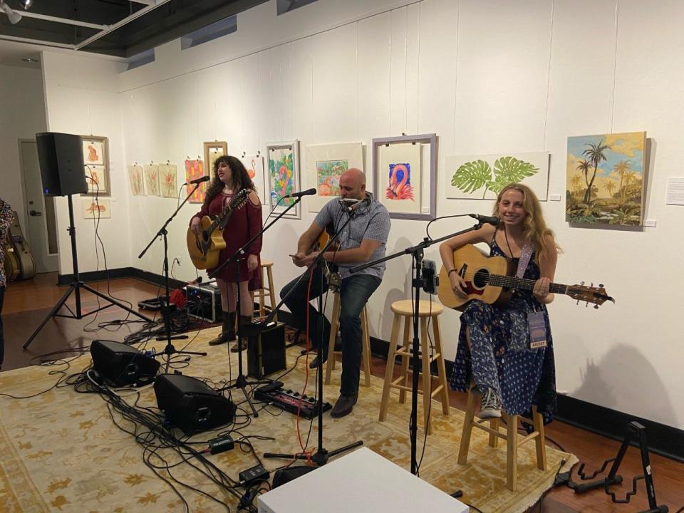 Three singer-songwriters shared the stage inside the Panama City Center for the Arts at a previous Panama City Songwriters Festival.