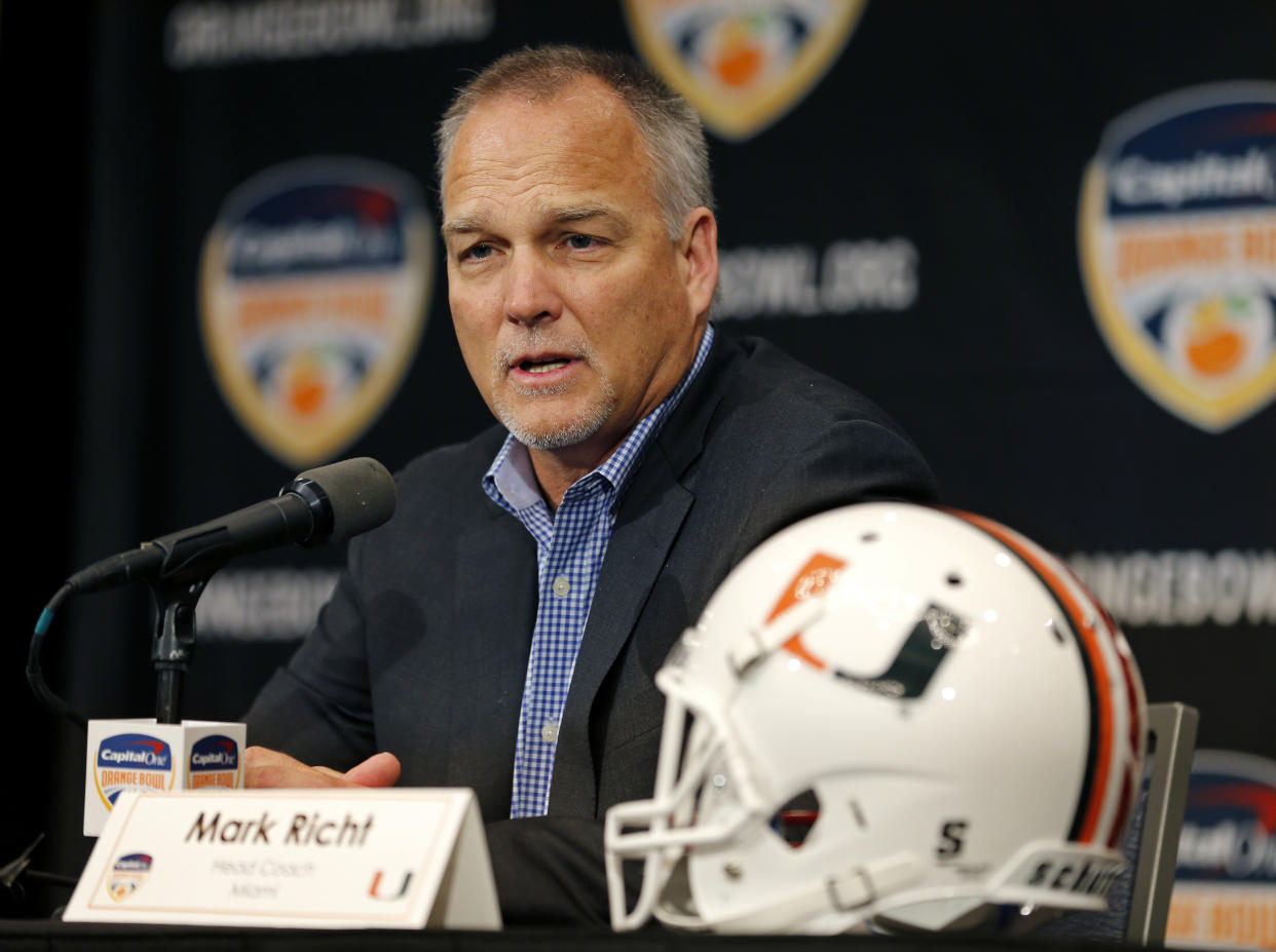 Miami head coach Mark Richt speaks at an NCAA college football news conference in Fort Lauderdale, Fla., Friday, Dec. 29, 2017. Miami plays Wisconsin in the Orange Bowl on Saturday, Dec. 30. (AP Photo/Joe Skipper)