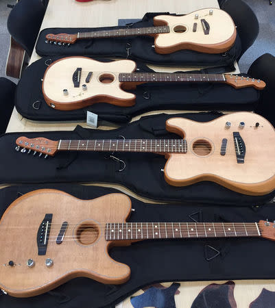 FILE PHOTO: Several models of Fender Musical Instruments Corporation's American Acoustasonic Series Telecaster guitar in Corona, California, U.S., are shown in this photo provided January 18, 2019. Fender Musical Instruments Corp/Handout via REUTERS
