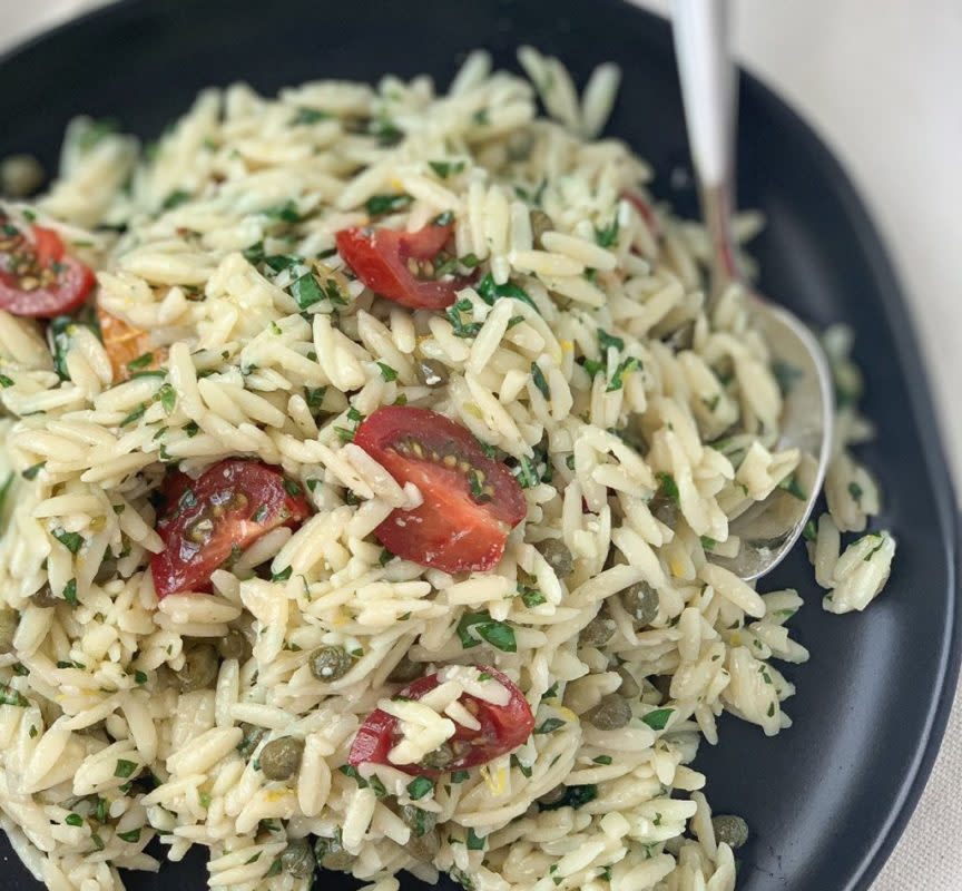 <p>Season and Thyme</p><p>Pesto orzo salad is a fresh and simple side dish that is perfect for the summer months. This salad recipe is a cinch to put together, with very little prep work or chopping involved. </p><p><strong>Get the recipe:</strong> <a href="https://seasonandthyme.com/pesto-orzo-with-capers-and-tomatoes/?fbclid=IwAR0F8ySoiWHxD1J_nBXqrHKLgJ_zulqxIPij5hEvd1SgPOOXF0yS9vMvjKk" rel="nofollow noopener" target="_blank" data-ylk="slk:Pesto Orzo Salad;elm:context_link;itc:0;sec:content-canvas" class="link "><strong>Pesto Orzo Salad</strong></a></p>