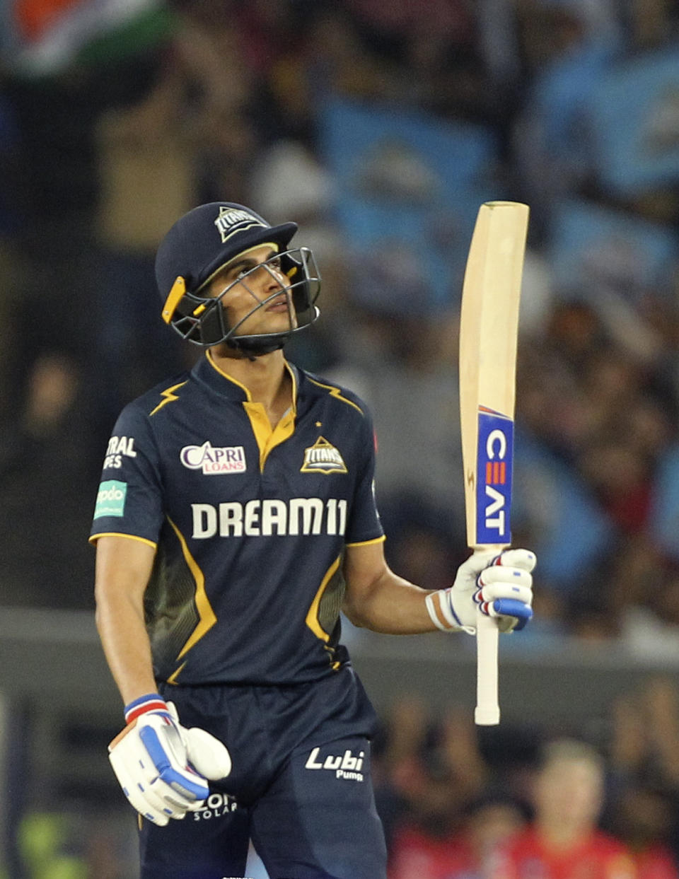 Gujarat Titans' captain Shubman Gill celebrates his fifty runs during the Indian Premier League cricket match between Gujarat Titans and Punjab Kings in Ahmedabad, India, Thursday, April 4, 2024. (AP Photo/STR)