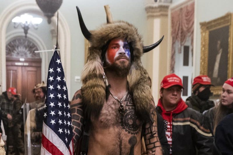 "QAnon shaman" Jacob Chansley, seen in the halls of the U.S. Capitol on Jan. 6, 2021, has filed in Arizona to run for the U.S. House of Representatives. Photo by Jim Lo Scalzo/EPA-EFE