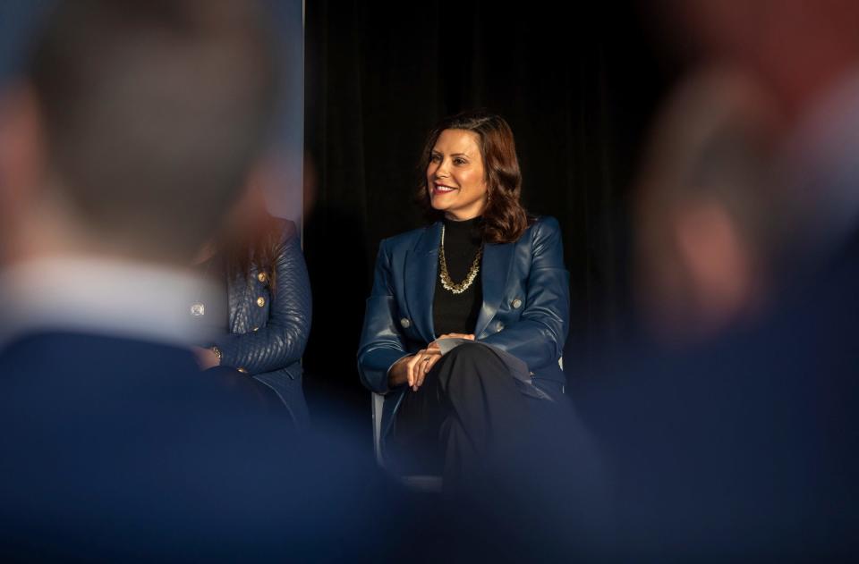 Gov. Gretchen Whitmer smiles as she listens to a speaker during the groundbreaking event for the University of Michigan Center for Innovation in Detroit on Thursday, Dec. 14, 2023.