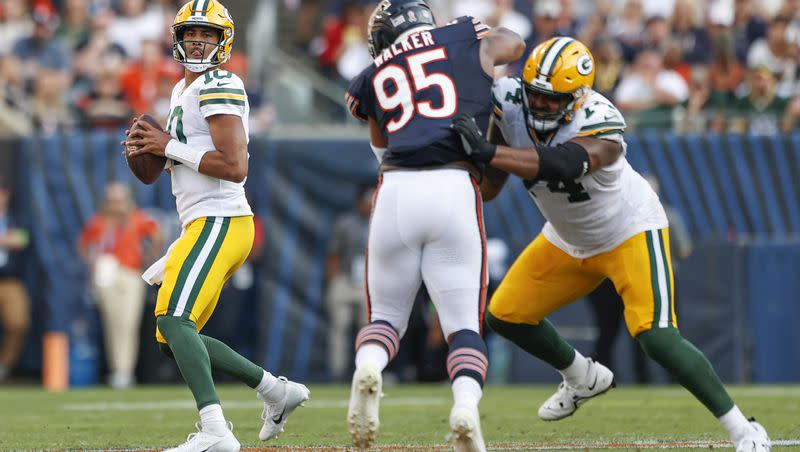 Green Bay Packers quarterback Jordan Love looks to pass against Chicago Sunday, Sept. 10, 2023, in Chicago. The former Utah State standout made a quite the splash during season opener vs. the Bears.