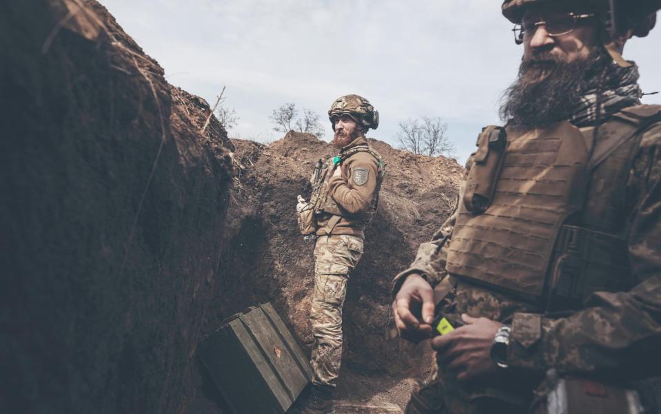 Ukrainian soldiers in a trench in the direction of Bakhmut - Getty Images