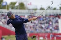 Team USA's Xander Schauffele hits a shot on the first hole during a practice day at the Ryder Cup at the Whistling Straits Golf Course Tuesday, Sept. 21, 2021, in Sheboygan, Wis. (AP Photo/Charlie Neibergall)