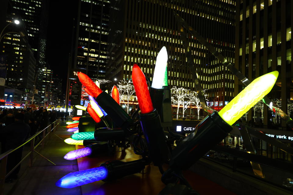 Giant Christmas lights line the sidewalk near Radio City Music Hall. (Photo: Gordon Donovan/Yahoo News)