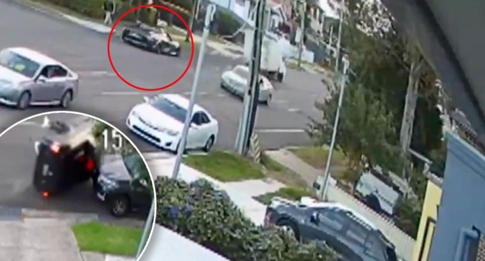 CCTV showing black ute driving in Merrylands before crashing into vehicle and flipping. 