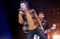 <p>Morgan Wallen performs at the Ryman Auditorium on Tuesday in Nashville.</p>