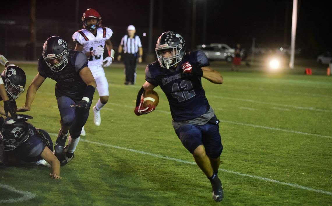 Stone Ridge Christian senior running back Hector Esquivez runs the ball during a game against Woodland Christian on Saturday, Sept. 10, 2022 at Castle Field.