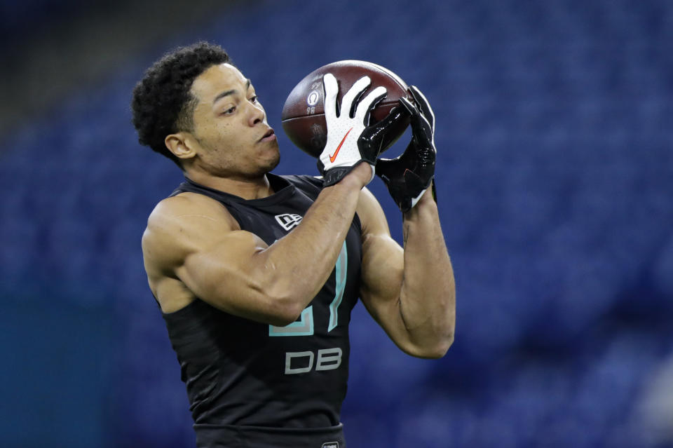 Penn State defensive back John Reid runs a drill at the NFL football scouting combine in Indianapolis, Sunday, March 1, 2020. (AP Photo/Michael Conroy)