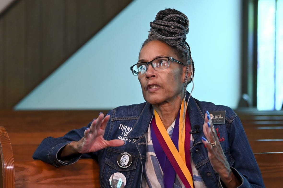 Civil rights foot soldier Della Simpson Maynor talks on May 19, 2023, about being clubbed by police on Feb. 18, 1965, the night activist Jimmie Lee Jackson was fatally wounded, while seated near the scene of the confrontation in Zion Church in Marion, Alabama. The 14-year-old Maynor was part of a group planning to march to the Perry County jail where a local SCLC field secretary was being held for registering voters. Maynor also heard the gunshots that killed Jackson during the struggle. (AP Photo/Julie Bennett)