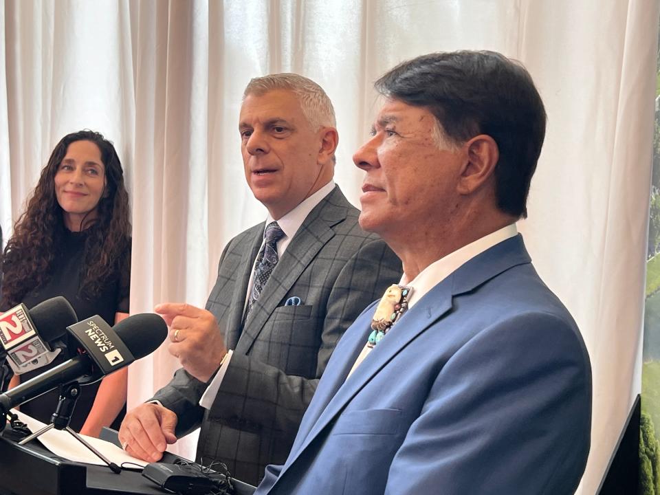 Oneida County Executive Anthony Picente Jr., center, speaks about Turning Stone expansion plans as Ray Halbritter, Oneida Indian Nation representative and Oneida Nation Enterprises CEO, looks on.