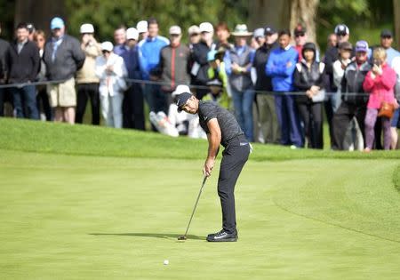 February 16, 2017; Pacific Palisades, CA, USA; Jason Day putts on the first hole green during the first round of the Genesis Open golf tournament at Riviera Country Club. Mandatory Credit: Gary A. Vasquez-USA TODAY Sports