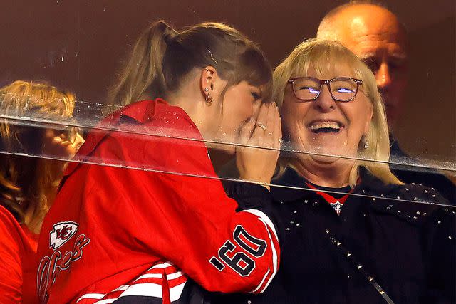 <p>David Eulitt/Getty</p> Taylor Swift and Donna Kelce look on before the game between the Kansas City Chiefs and the Denver Broncos at GEHA Field at Arrowhead Stadium on October 12, 2023