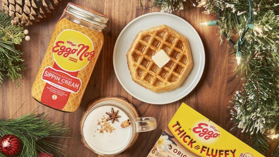 Eggo Nog on a table next to a waffle and drinnk