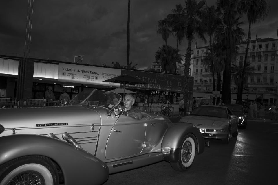 A vintage car drives along the Croisette during the 75th international film festival, Cannes, southern France, Tuesday, May 24, 2022. (AP Photo/Petros Giannakouris)
