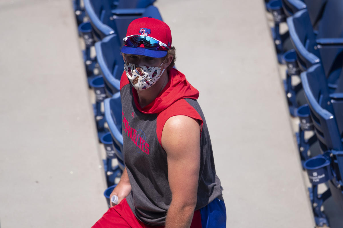 With runners on, Rhys Hoskins could wear mask at first base