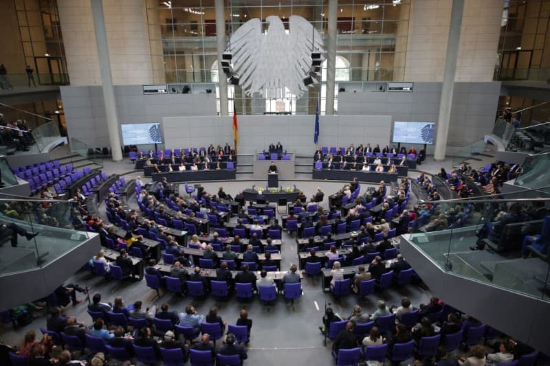 Ukrainian President Volodymyr Zelensky delivers a speech in the German parliament (Bundestag).  Zelensky is in Berlin for the International Ukraine Reconstruction Conference in Berlin.  Hannes Albert/dpa