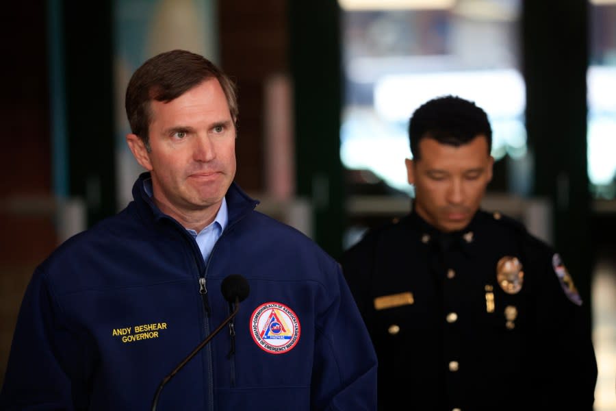 Kentucky Gov. Andy Beshear (left) won election to a new term. Above, he addresses a news conference in April after a gunman opened fire at the Old National Bank building in Louisville. (Photo by Luke Sharrett/Getty Images)