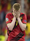 Belgium's Kevin De Bruyne reacts during the Euro 2020 soccer championship quarterfinal match between Belgium and Italy at the Allianz Arena stadium in Munich, Germany, Friday, July 2, 2021. (AP Photo/Matthias Schrader, Pool)