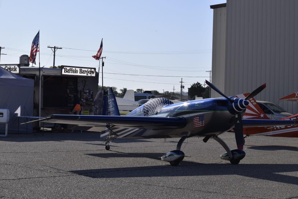 An Extra 330SC is parked near Hangar 509 as part of the 2023 U.S. National Aerobatic Championships. The 330SC is owned and flown by pilot Goody Thomas, who has been part of the U.S. national unlimited team for several years.
