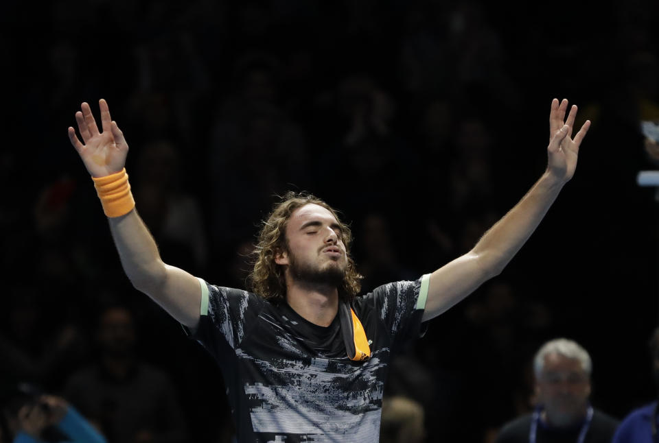 Stefanos Tsitsipas of Greece reacts after defeating Austria's Dominic Thiem to win their ATP World Finals singles final tennis match at the O2 arena in London, Sunday, Nov. 17, 2019. (AP Photo/Kirsty Wigglesworth)