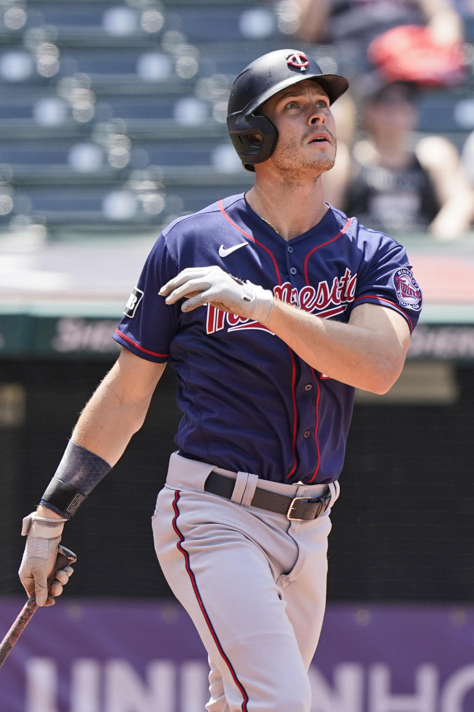 Minnesota Twins' Max Kepler watches his three-run home run in the fourth inning of a baseball game against the Cleveland Indians, Sunday, May 23, 2021, in Cleveland. (AP Photo/Tony Dejak)