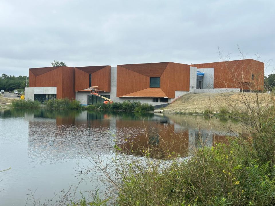 The design of the museum at the Edelman Fossil Park is meant to evoke a camera lens, suggesting a look at the past and present.