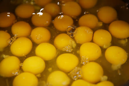 Egg yolks and whites are seen at a bakery in Seoul, South Korea, December 22, 2016. REUTERS/Kim Hong-Ji