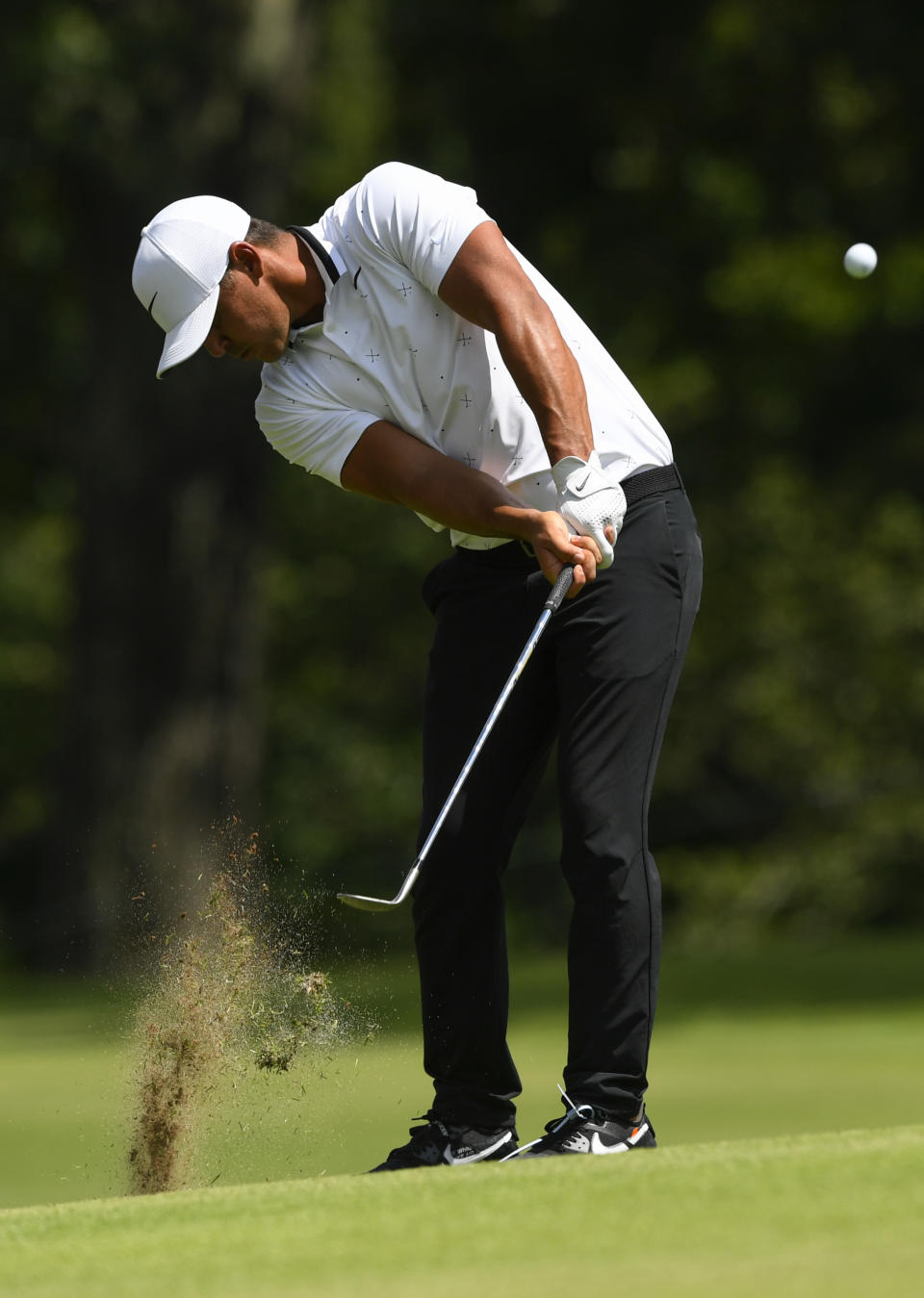 Brooks Koepka hits from the fifth fairway during the second round of the Tour Championship golf tournament Friday, Aug. 23, 2019, in Atlanta. (AP Photo/John Amis)