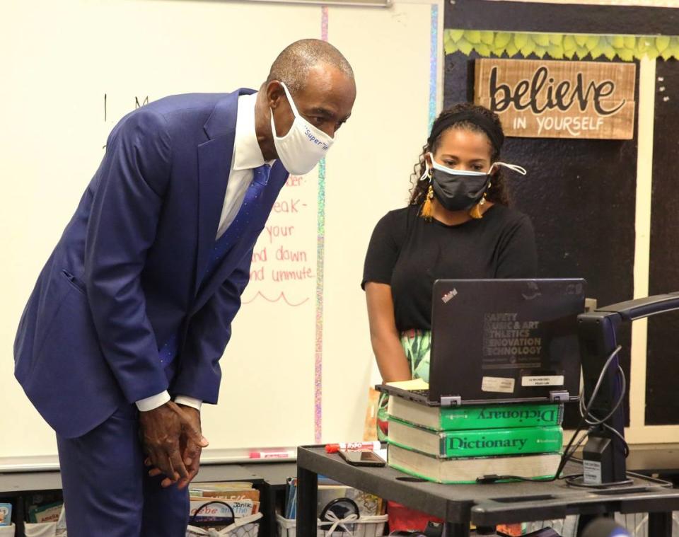 Broward Schools Superintendent Robert Runcie leans in toward teacher Skylar Billingsley’s laptop to say hello to her students at Nova Blanche Forman Elementary School during the first day of online learning on Aug. 19. All Broward County public schools are teaching classes remotely because of COVID-19.